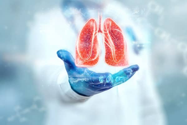 The doctor looks at the hologram of Lungs, checks the test result on the virtual interface and analyzes the data. Pneumonia, donation, innovative technologies, medicine of the future